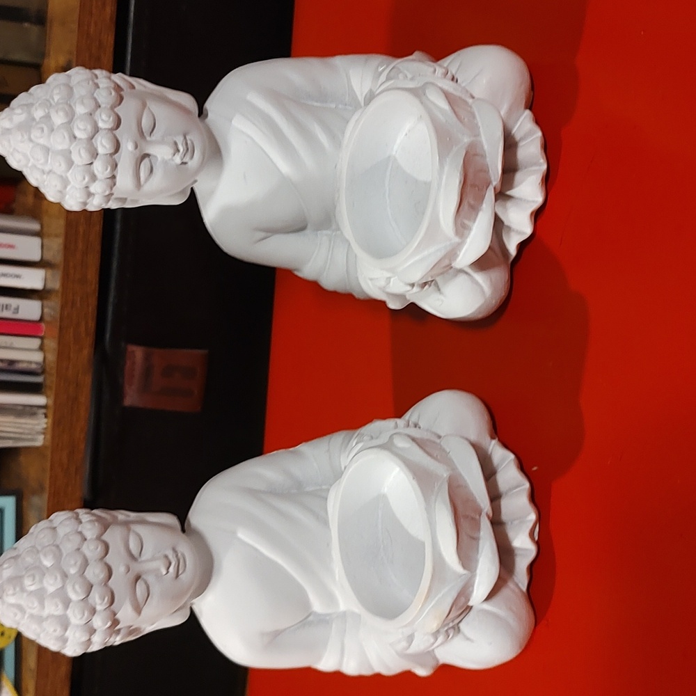 Buddha tea light candle holders.